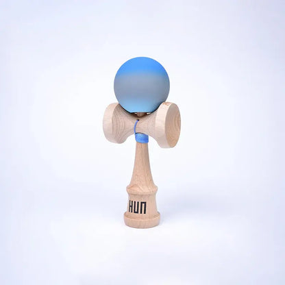 HUN Kendama Kylin Model with a blue and gray gradient ball, natural wood handle, and light background.