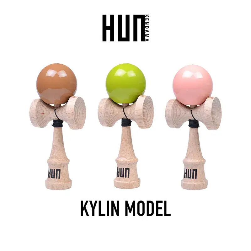 HUN Kendama Kylin Model product image featuring three wooden kendamas with glossy brown, lime green, and pink balls on a light gray background.